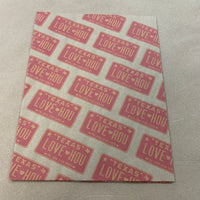 LOVE HOU Texas License Plate Wrapping Paper Red and Yellow
